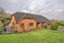 Main Photo of a 4 bedroom  Detached Bungalow for sale