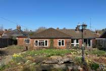 Main Photo of a 4 bedroom  Detached Bungalow for sale