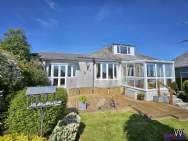 Main Photo of a 5 bedroom  Detached Bungalow for sale