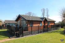 Main Photo of a 3 bedroom  Lodge for sale